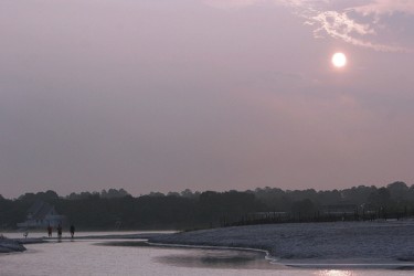 Spend your days enjoying the beach from sunrise...